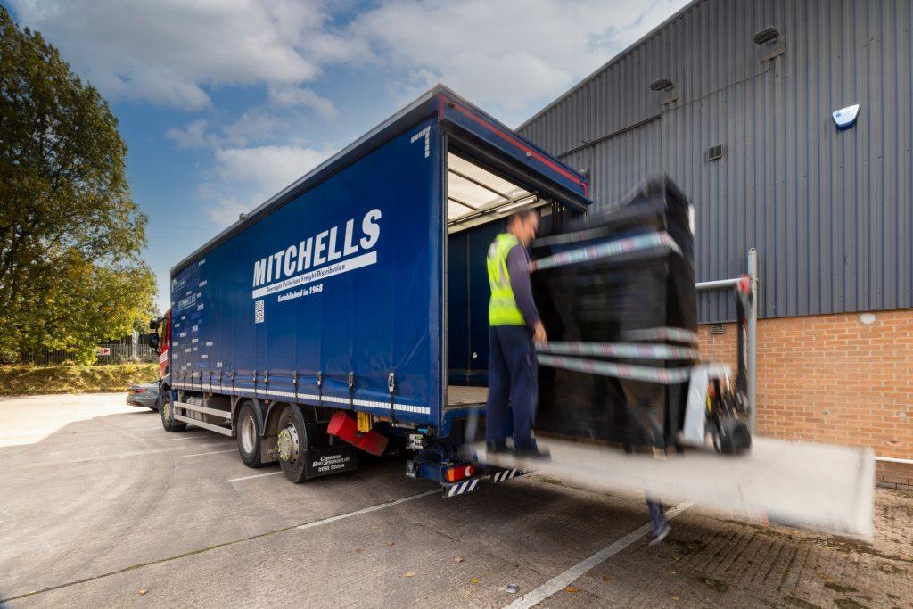 Mitchells driver delivering palletised freight